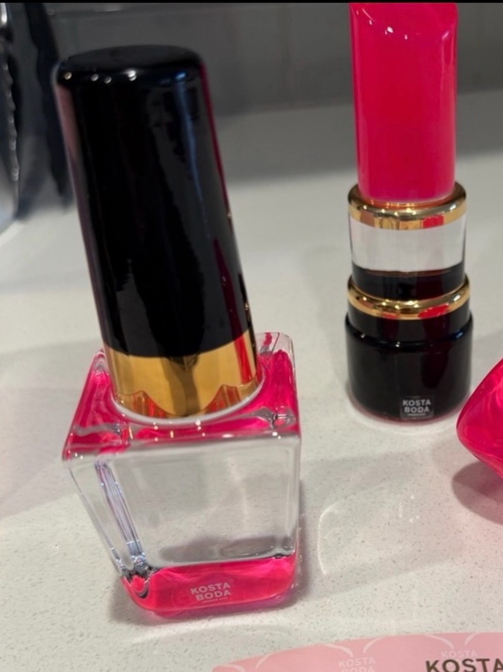 Kosta Boda Hot Pink Glass Sculpture Duo - “Make-Up”
